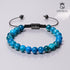 Apatitarmband in glänzendem Blau auf hellem Hintergrund mit Feder – UNIQAL Schmuck mit Leichtigkeit